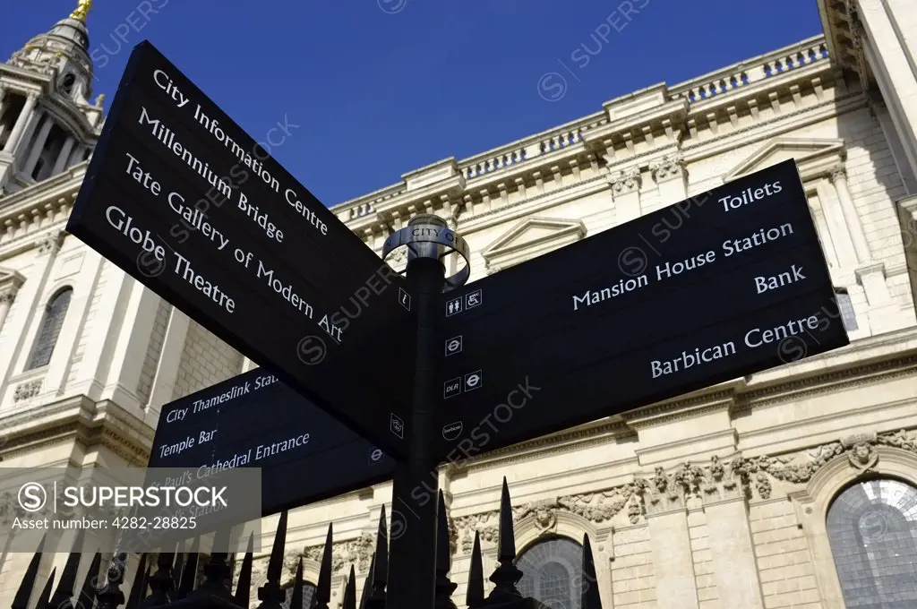 England, London, City of London. Signpost outside St Paul's Cathedral in the City of London.