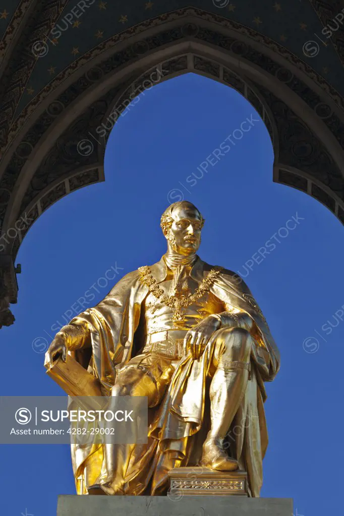 England, London, South Kensington. Statue of Prince Albert seated in the centre of the Albert Memorial. The memorial was commissioned by Queen Victoria in memory of her husband. It was designed by Sir George Gilbert Scott and opened in 1872.