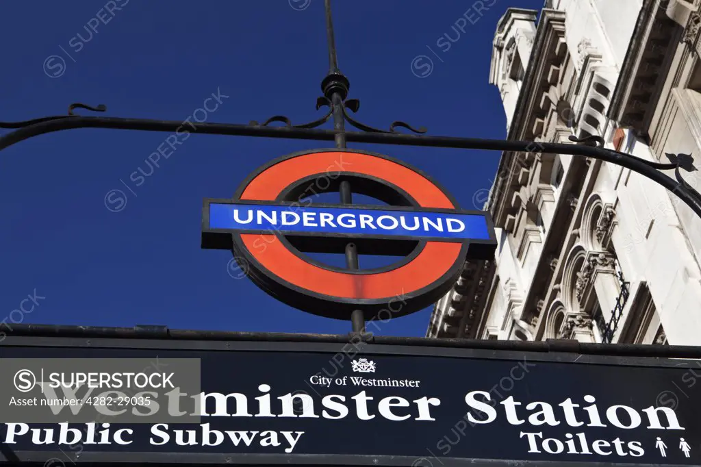 England, London, Westminster. Underground sign outside Westminster station.