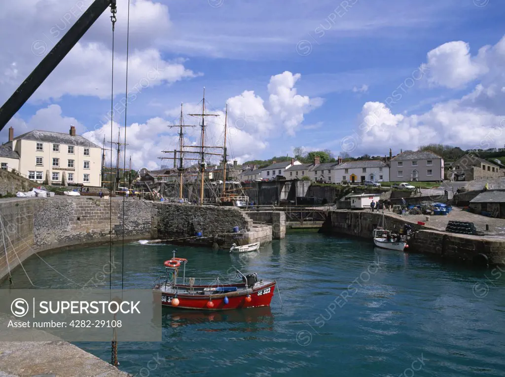 England, Cornwall, Charlestown. Charlestown is a famous film and television location (Poldark, etc.) built 1793-1801 for local industrialist Charles Rashleigh. The dock is still used to export China clay and refit tall ships. Two small local fishing boats known as 'toshes' are moored in the outer harbour.