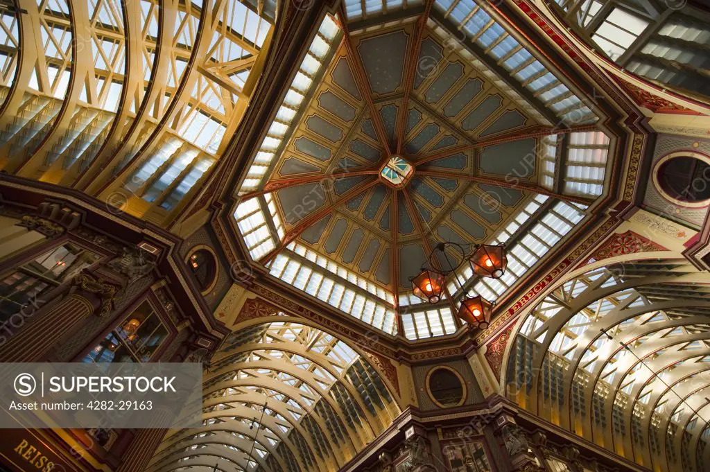 England, London, City of London. The ornate and highly decorative roof in Leadenhall Market, a preserved Victorian covered shopping mall at Gracechurch Street in the City of London.
