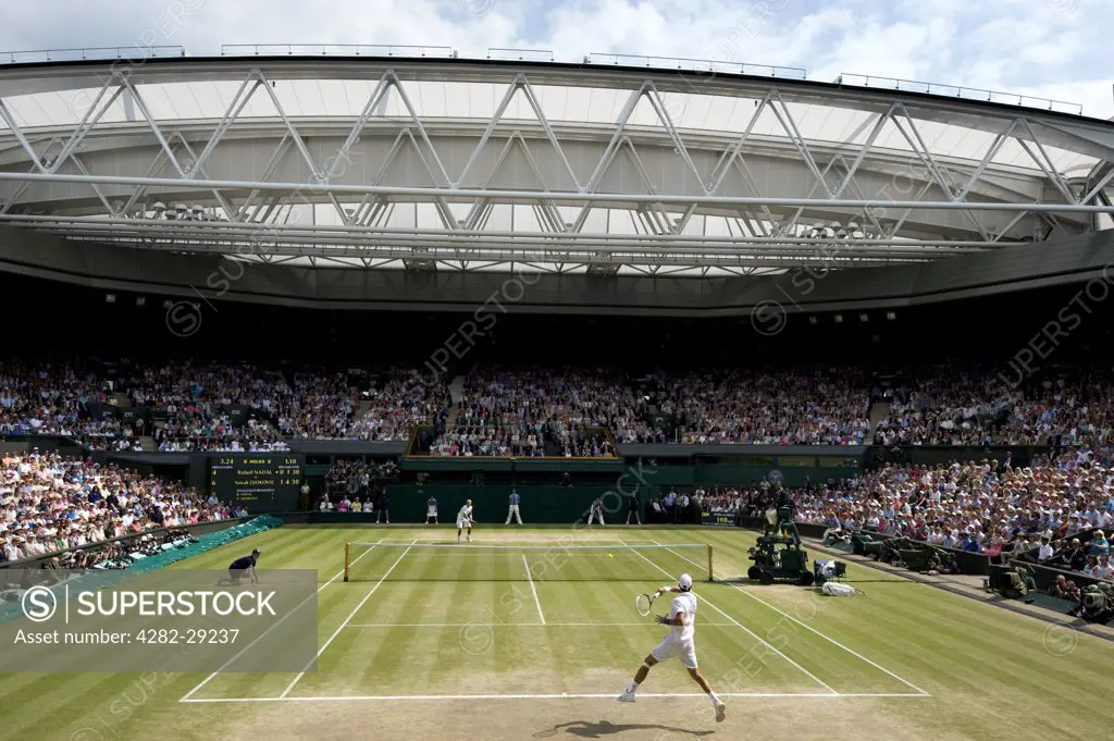 England, London, Wimbledon. The Men's Singles Final on Centre Court at the 2011 Wimbledon Tennis Championships between Novak Djokovic and Rafael Nadal.