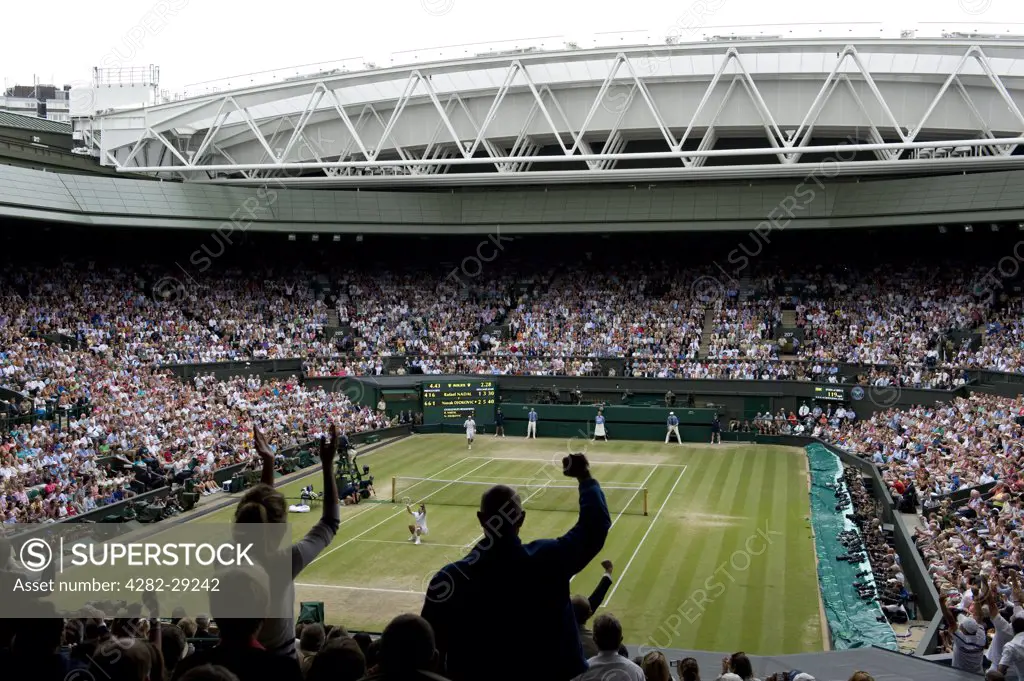 England, London, Wimbledon. Novak Djokovic celebrates on Centre Court having beaten Rafael Nadal in the Men's Singles Final at the 2011 Wimbledon Tennis Championships.