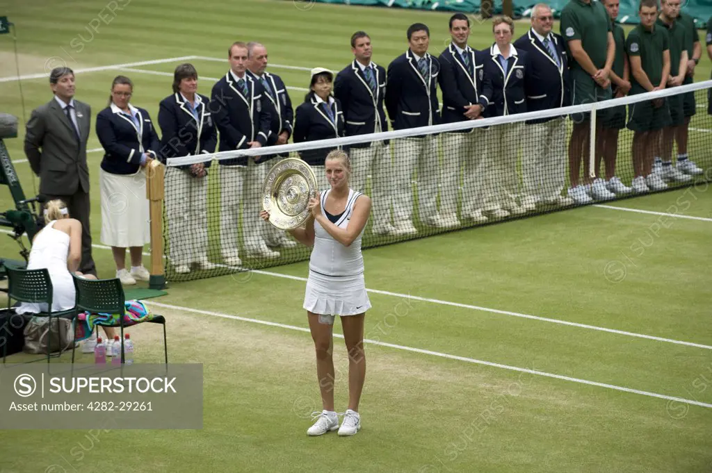 England, London, Wimbledon. Petra Kvitova (CZE) with the Venus Rosewater Dish on centre court after victory in the Ladies' singles final at the 2011 Wimbledon Tennis Championships.
