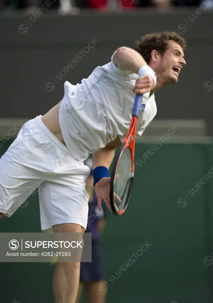 England, London, Wimbledon. Andy Murray (GBR) serving in a match at the 2011 Wimbledon Tennis Championships.
