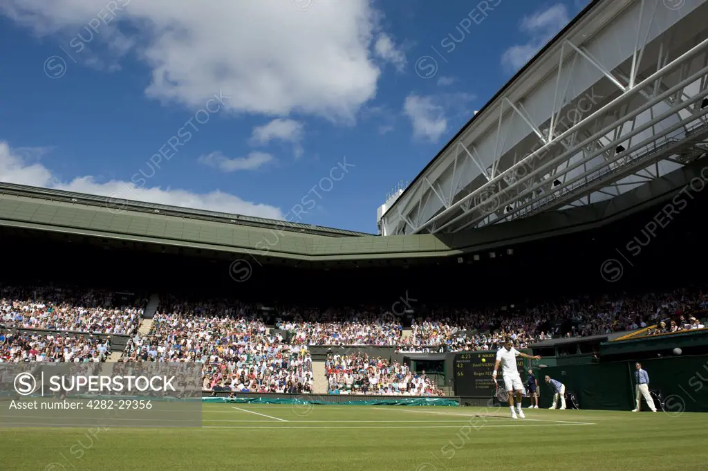 England, London, Wimbledon. Roger Federer in action on Centre Court at the 2011 Wimbledon Tennis Championships.