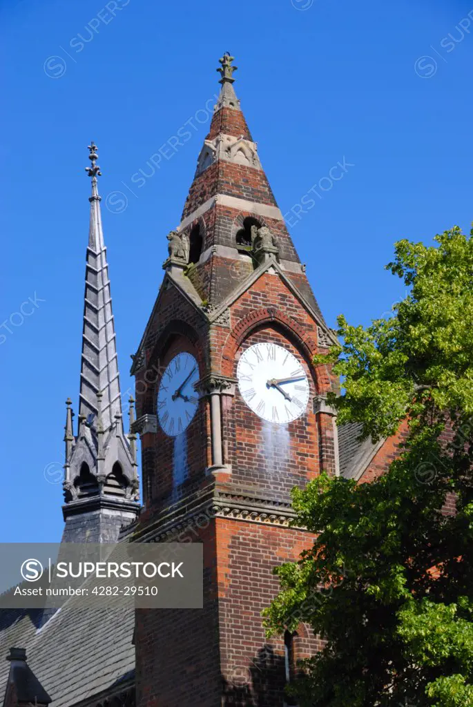 England, London, Highgate Village. Highgate School Chapel clock tower.