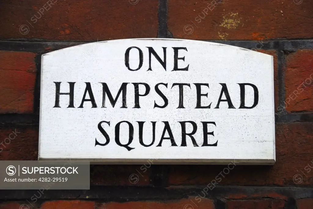England, London, Hampstead. One Hampstead Square plaque mounted on a wall outside a house.