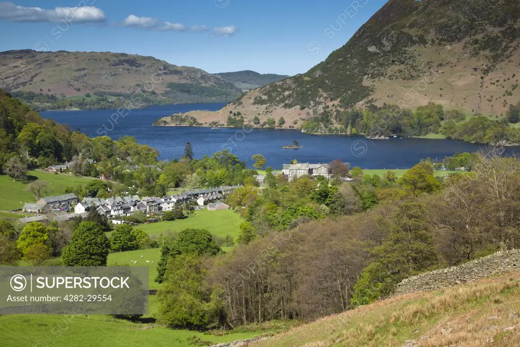 England, Cumbria, Glenridding. View over the village of Glenridding to Ullswater, the second largest lake in the Lake District.