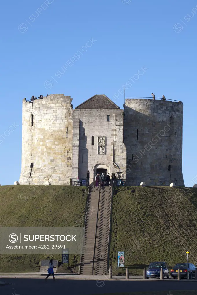 England, North Yorkshire, York. Clifford's Tower, a 13th century stone keep on a mound, almost all that remains of York Castle.