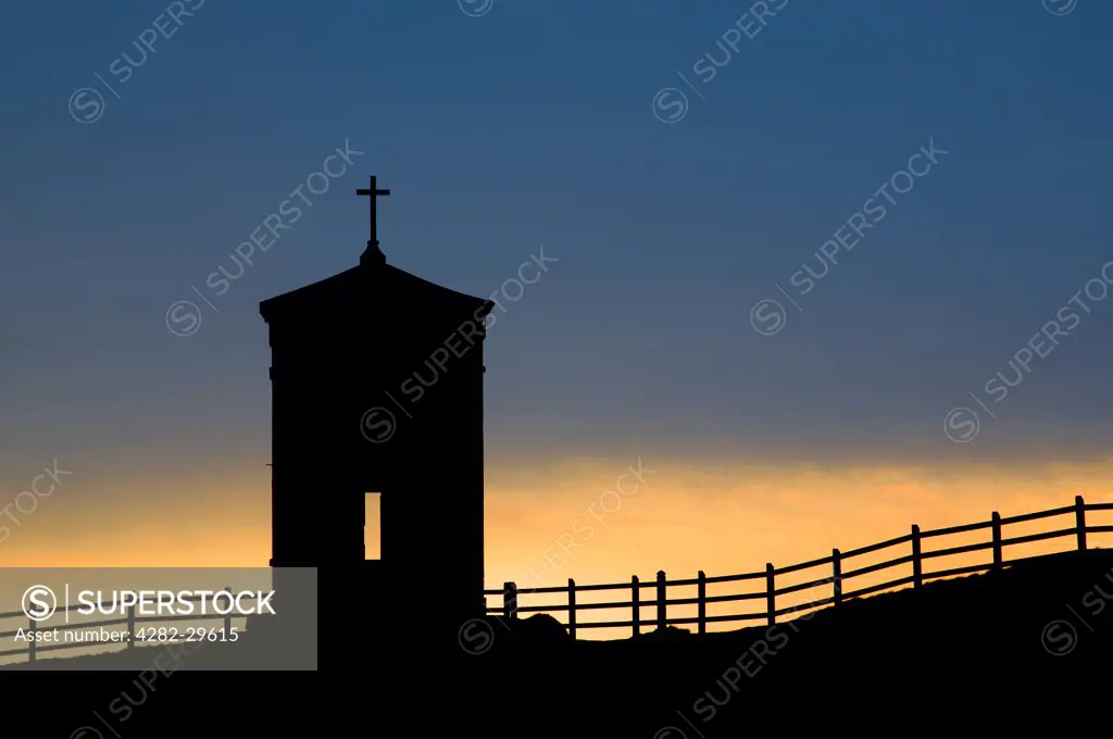 England, Cornwall, Bude. Silhouette of Compass Point (The Pepper Pot), a former coastguard tower built in 1840, based on the Temple of the Winds in Athens.