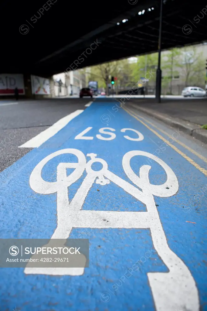 England, London, Southwark. A cycle lane defined by colour and symbols in the London Borough of Southwark.