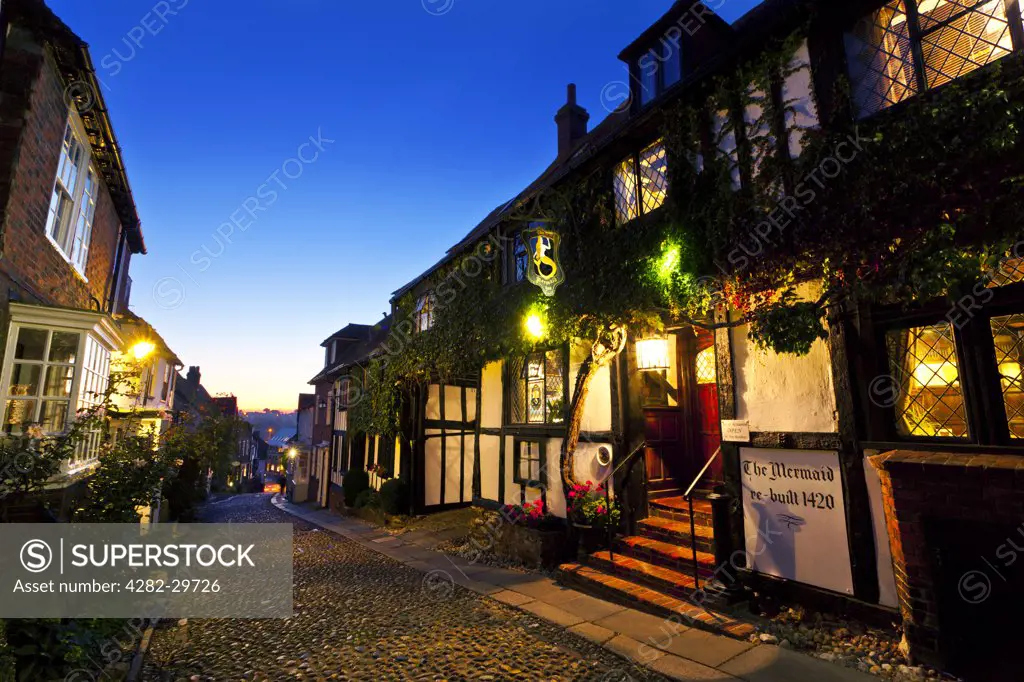 England, East Sussex, Rye. Picturesque cobbled street outside the historic Mermaid Inn in Rye.