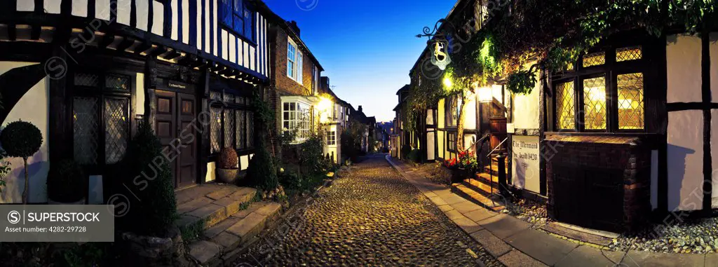 England, East Sussex, Rye. Panoramic view of the picturesque cobbled street outside the historic Mermaid Inn in Rye.