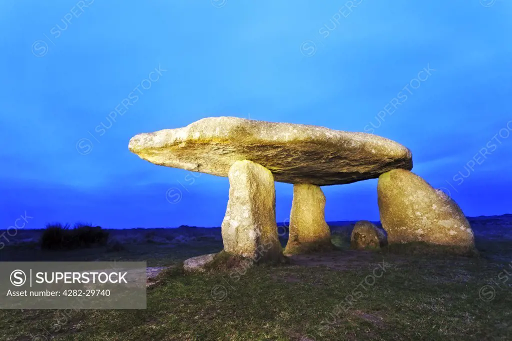 England, Cornwall, St Just. Lanyon Quoit, a megalithic monument believed to be the burial chamber of a long mound, at dusk.