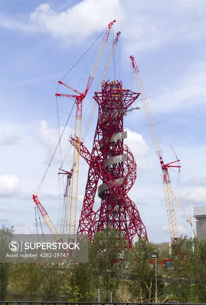 England, London, Stratford. Construction of the ArcelorMittal Orbit observation tower in the Olympic Park in Stratford.