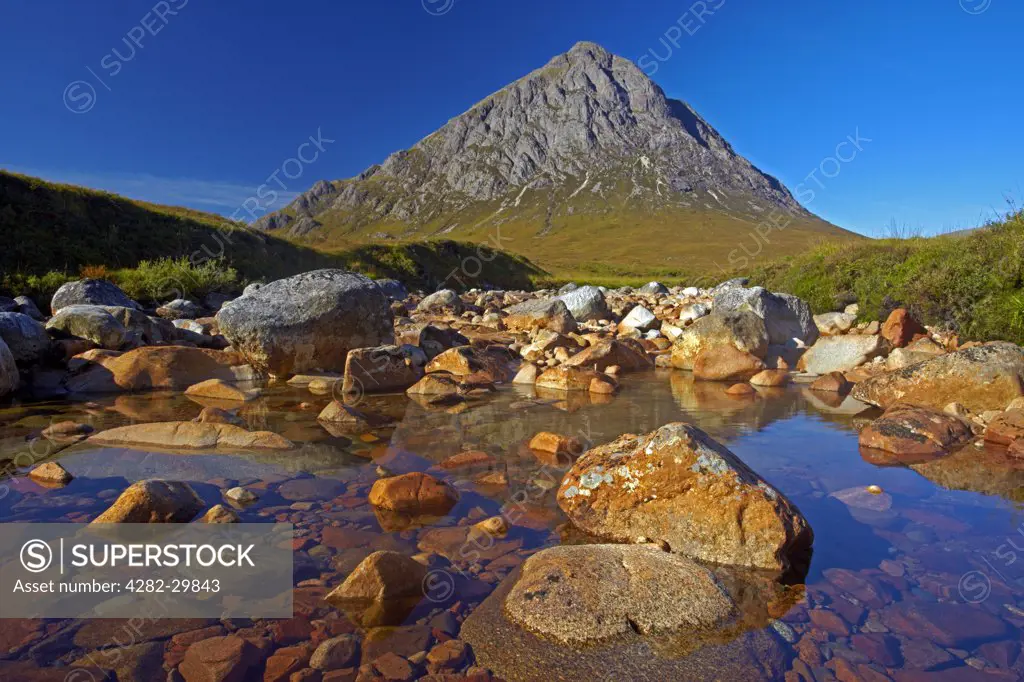 Scotland, Highland, Rannoch Moor. Buchaille Etive Mor, one of the most recognisable mountains in Scotland, from the River Coupall on Rannoch Moor.