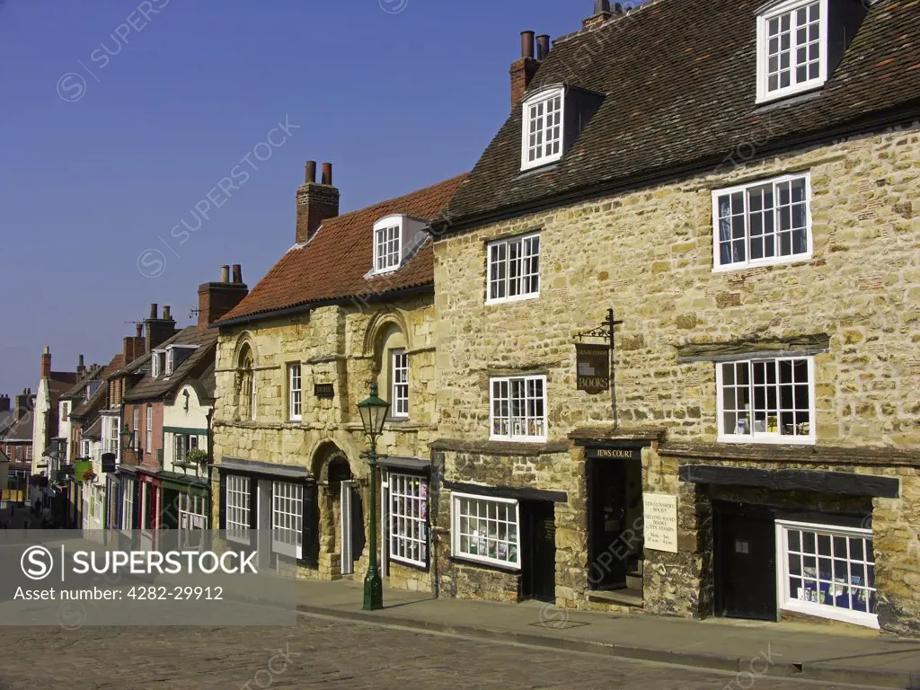 England, Lincolnshire, Lincoln. The Jew's House on Steep Hill was built at the end of the 12th century and is one of the oldest domestic buildings still in use in Britain.