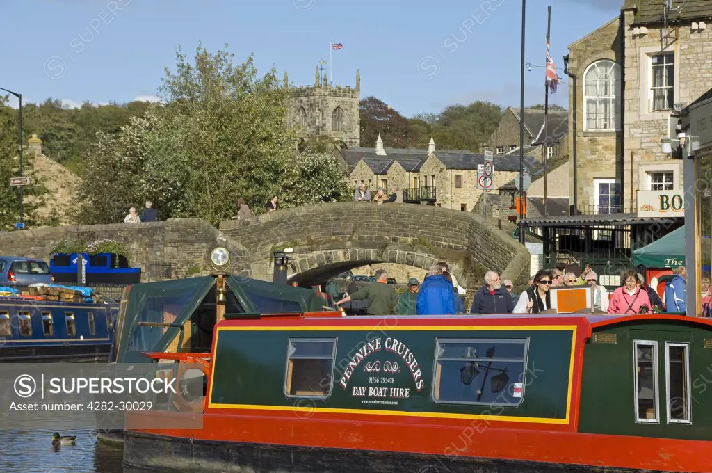 England, North Yorkshire, Skipton. Narrow boats on the Leeds and Liverpool Canal at Skipton.