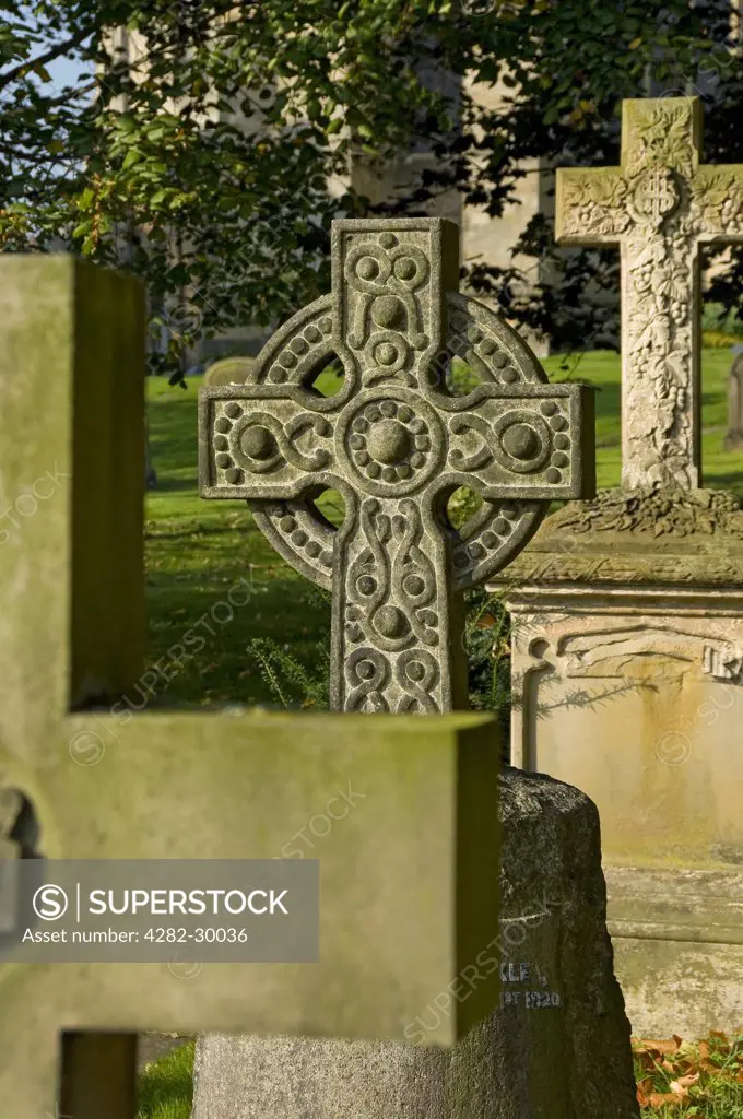 England, North Yorkshire, Ripon. Gravestones in the churchyard of Ripon Cathedral.
