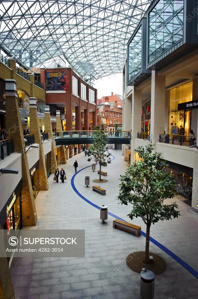 Northern Ireland, County Antrim, Belfast. Shops in the covered multi-level Victoria Square Shopping Centre, the biggest property development ever undertaken in Northern Ireland.