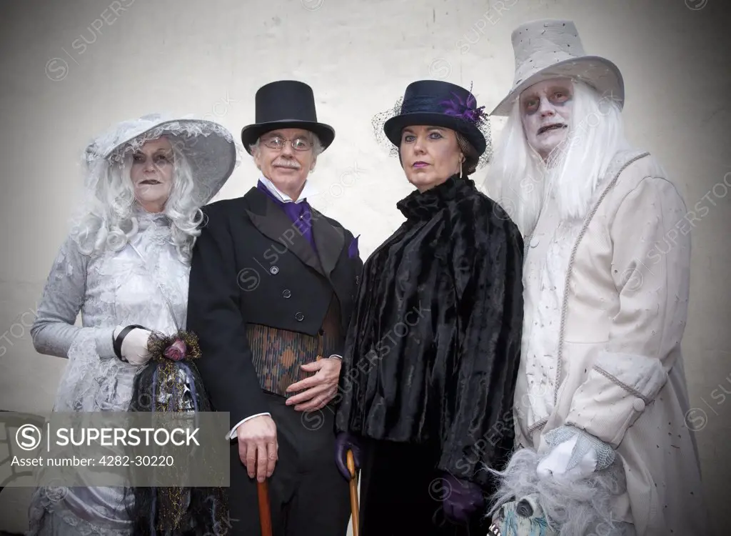 England, North Yorkshire, Whitby. People dressed up in sinister clothing for the Whitby Goth Weekend, a twice yearly festival held in Whitby because of its association with the novel 'Dracula'.