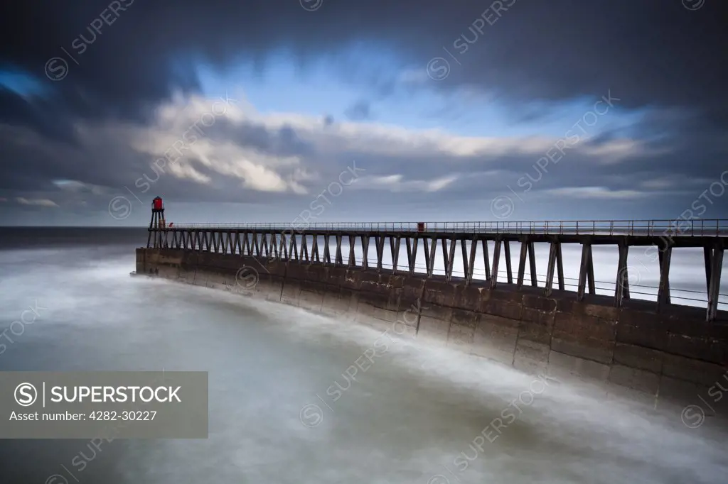 England, North Yorkshire, Whitby. Whitby East Pier Light on the end of the East Pier extension.