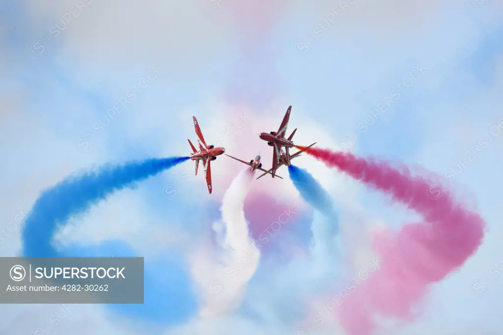England, Gloucestershire, Fairford. The Red Arrows aerobatic display at the Royal International Air Tattoo at RAF Fairford 2011.