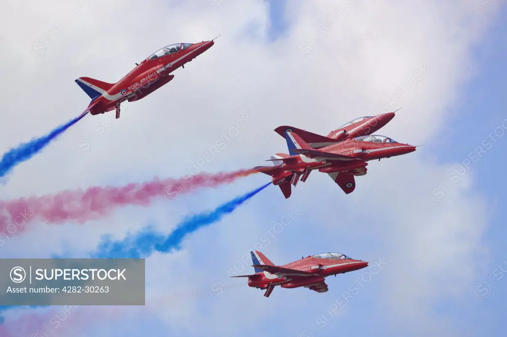 England, Gloucestershire, Fairford. The Red Arrows aerobatic display at the Royal International Air Tattoo at RAF Fairford 2011.