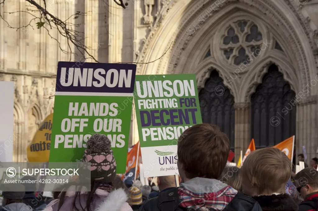 England, North Yorkshire, York. Members of UNISON trade union protesting for better pensions outside York Minster.