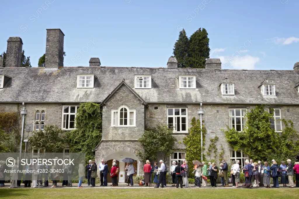 England, Devon, Dartington. People queuing for an event at The Telegraph Ways With Words Literary Festival at Dartington Hall.