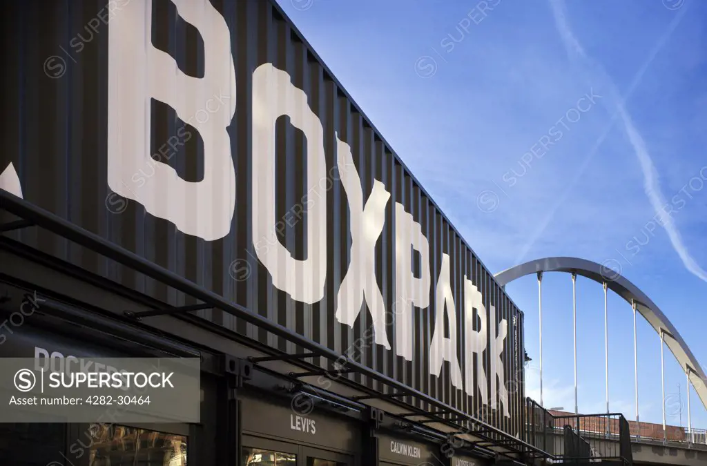 England, London, Shoreditch. Boxpark in Shoreditch, a pop-up shopping mall formed from shipping containers refitted to create low cost 'box shops'.