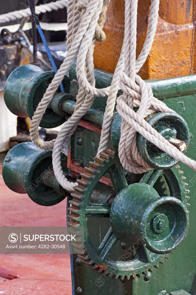 England, Essex, Maldon. Winches on board an old barge moored at Maldon on the Blackwater Estuary.