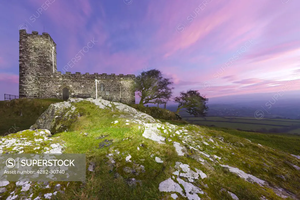 England, Devon, Brentor. The Church of St Michael, dating from the 13th century on top of Brent Tor on the edge of the Dartmoor National Park.