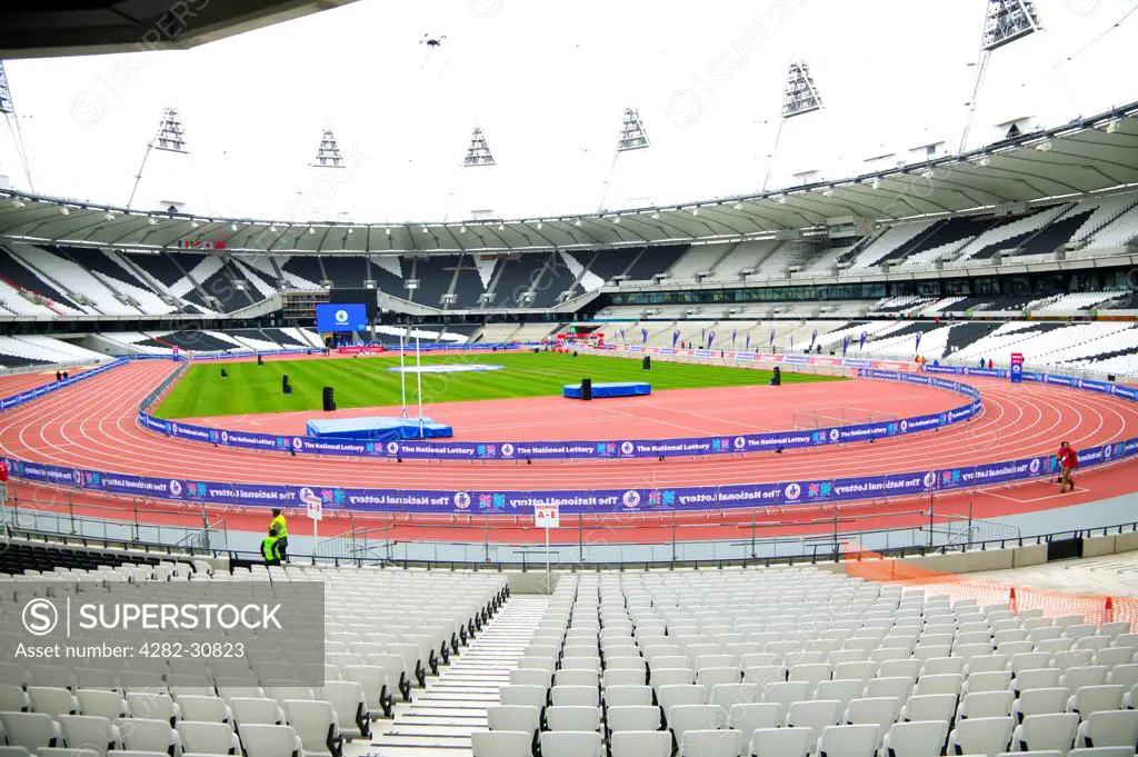 England, London, Stratford . An interior view of the Olympic stadium looking down onto the running track.