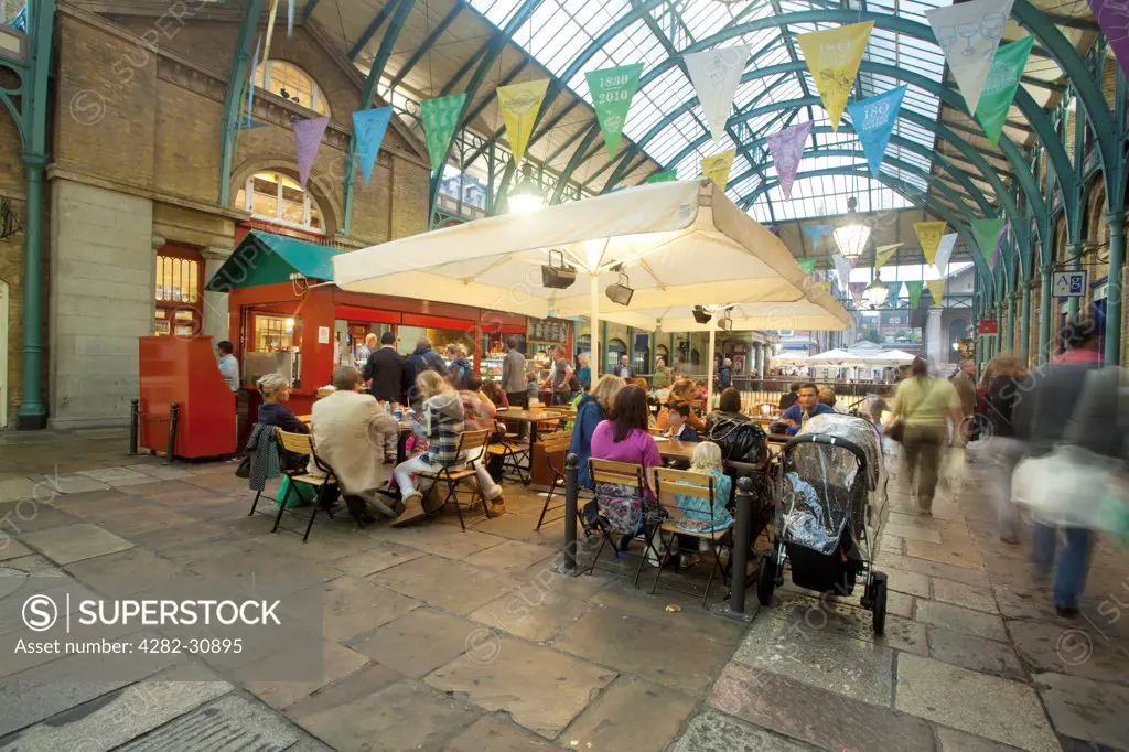 England, London, Covent Garden. A view of the indoor shopping plaza and restaurant at Covent Garden.