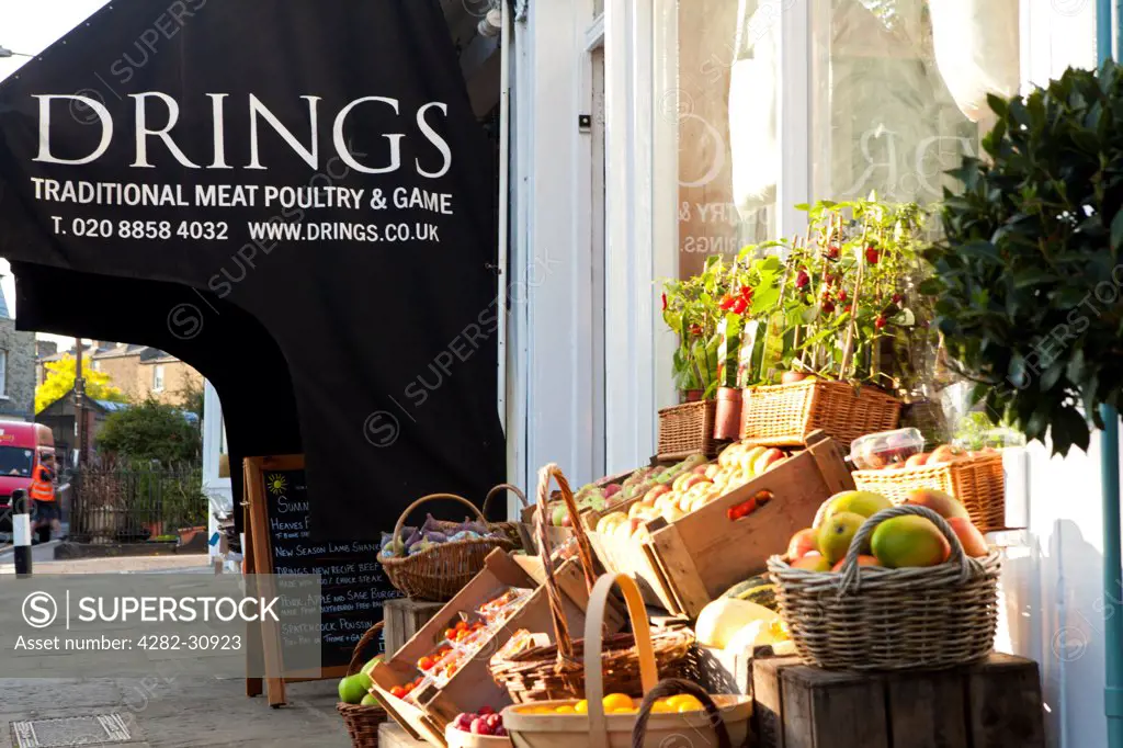 England, London, Greenwich. A view of a traditional fruit and veg shop in Greenwich village.