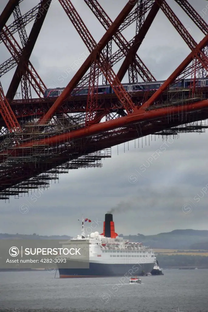 Scotland, City of Edinburgh, South Queensferry. The QE2 (Queen Elizabeth 2) at anchor in the River Forth at South Queensferry during her farewell tour in September 2007.