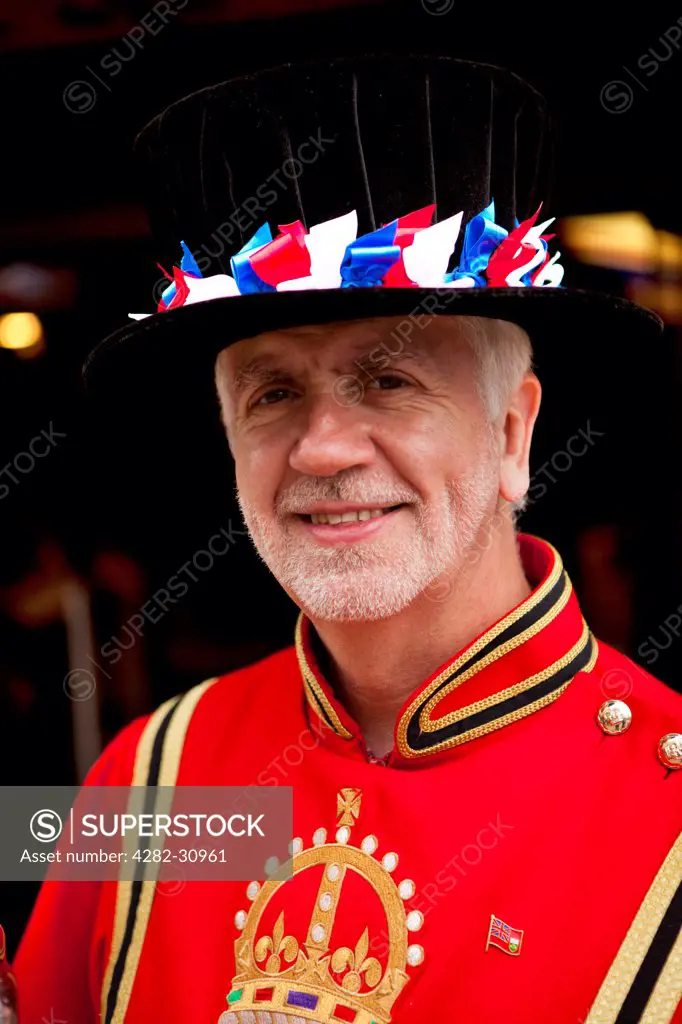 England, London, Bond Street. A man dressed in a Beefeater costume in London.