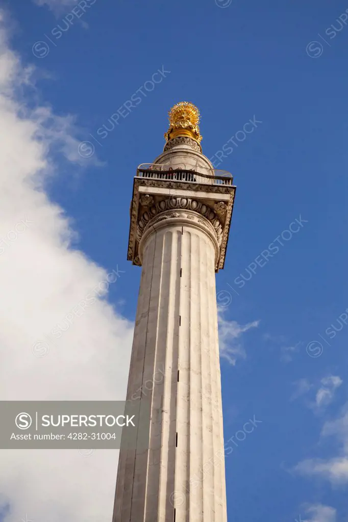 England, London, City of London. A view of the Monument in central London.
