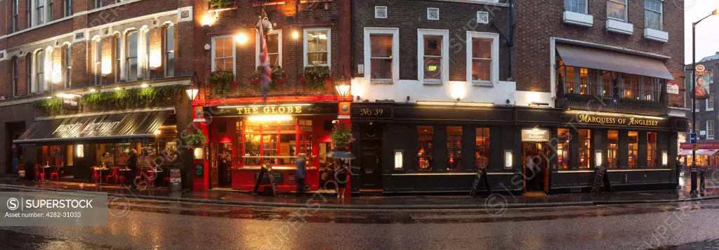 England, London, Covent Garden. A panoramic view of The Globe pub near Covent Garden on a wet day.