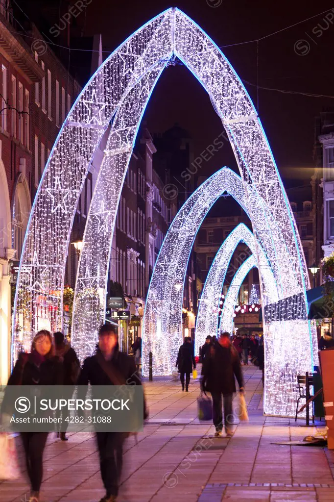 England, London, Mayfair. Christmas lights on South Molton Street in London.