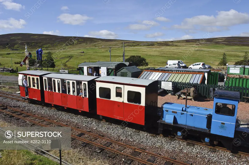 Scotland, South Lanarkshire, Leadhills. Passengers onboard a train on the narrow gauge Leadhills and Wanlockhead Railway.