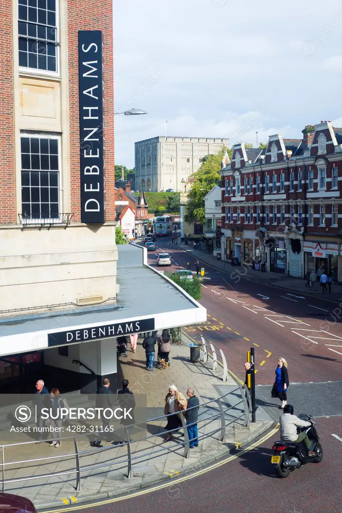 England, Norfolk, Norwich. Debenhams department store in Norwich showing the view up Red Lion street towards Norwich castle museum.