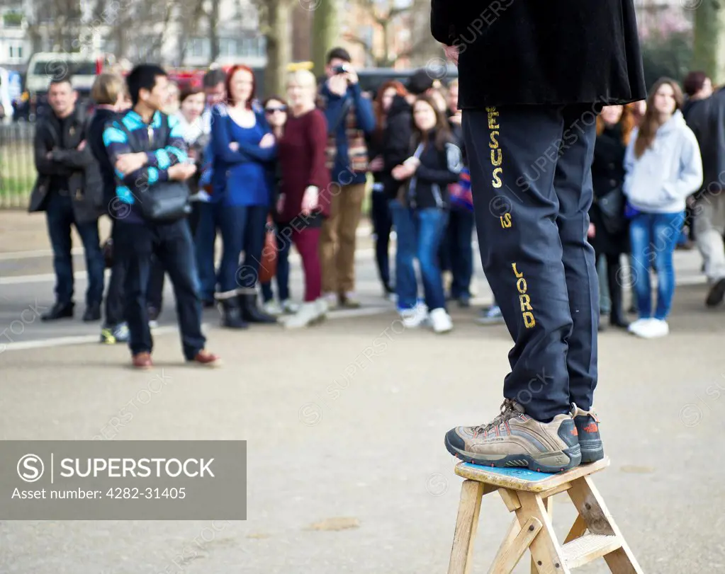 England, London, Hyde Park. A man standing on a wooden stepladder at Speakers Corner in London.