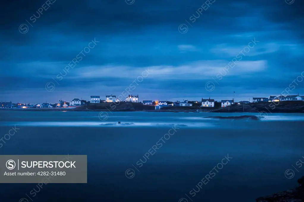 Wales, Anglesey, Trearddur Bay. Mist rolls over the sea at Trearddur Bay in Anglesey.