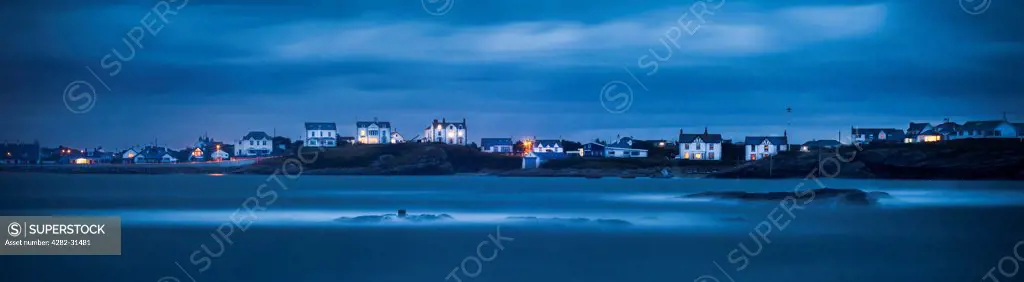 Wales, Anglesey, Trearddur Bay. Mist rolls over the sea at Trearddur Bay in Anglesey.