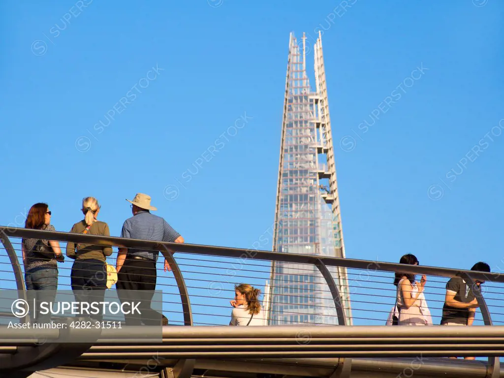England, London, The Shard. People looking at The Shard from the Millennium Bridge,.