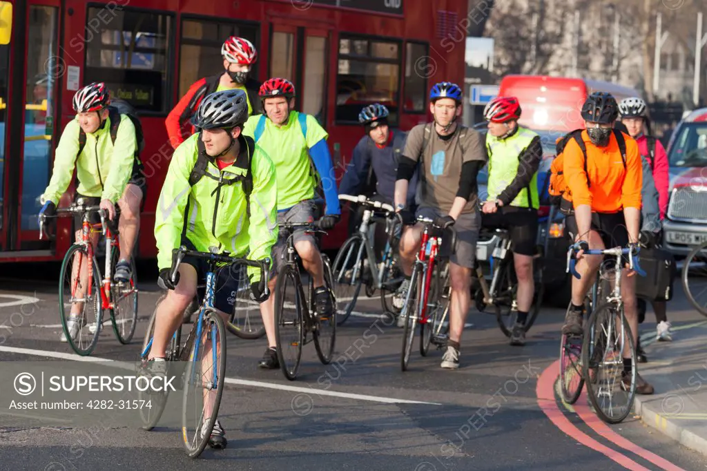 England, London, Victoria Embankment. Massed cyclists turning into Victoria Embankment in London.