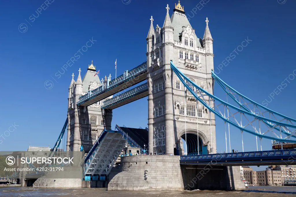 England, London, Tower Bridge. Tower Bridge during an autumn heat wave with centre span up.
